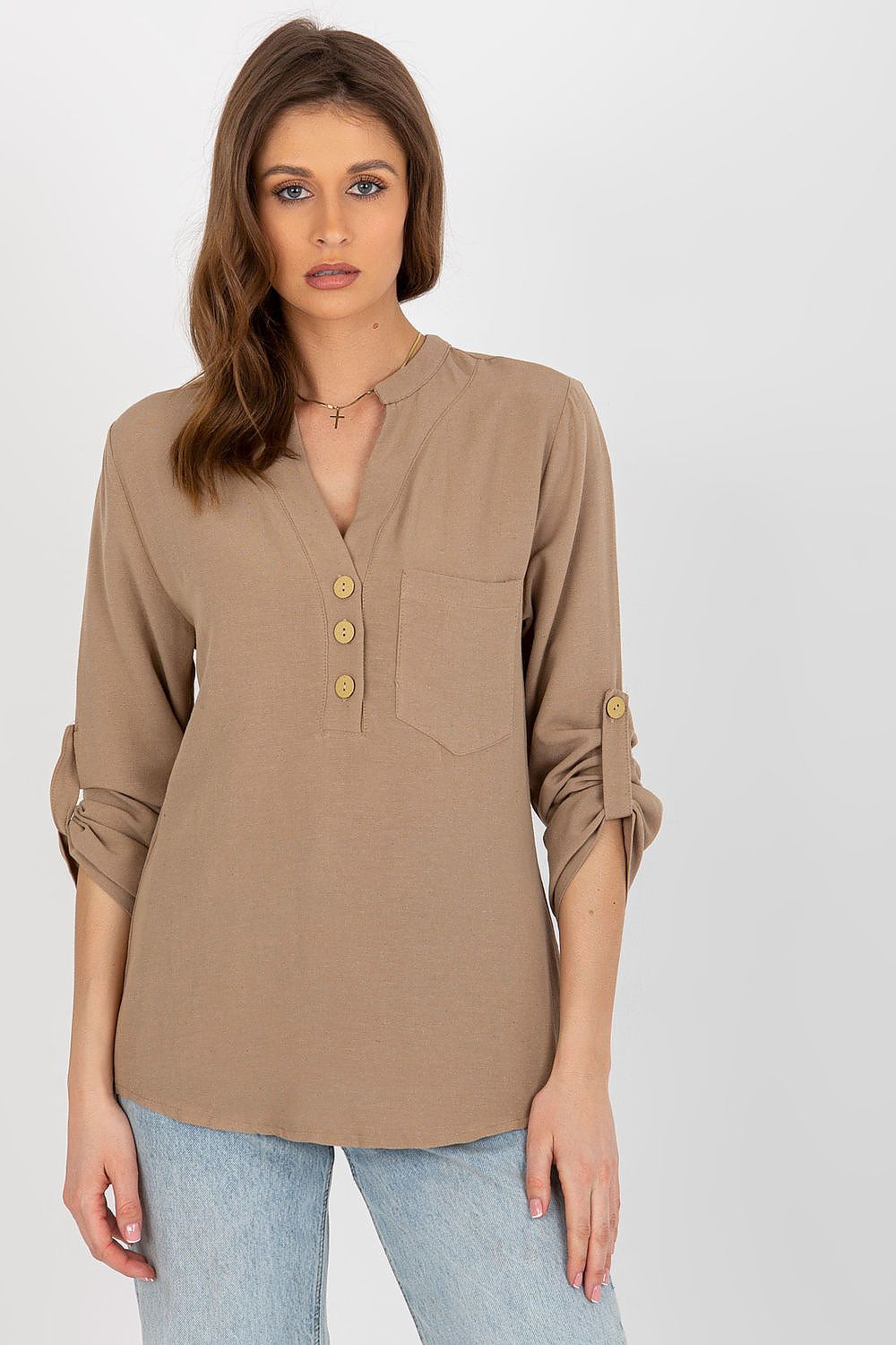Elegant Rue Paris cotton blend blouse featuring long sleeves and a heart-shaped neckline, accentuated by a decorative clasp and stylish pocket, perfect for sophisticated occasions.