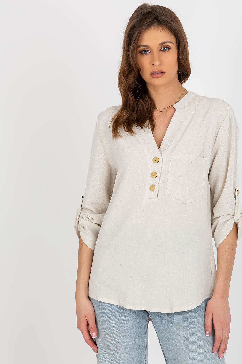 Luxurious Rue Paris cotton blend blouse featuring long sleeves and a heart-shaped neckline, styled elegantly with decorative buttons and a pocket.