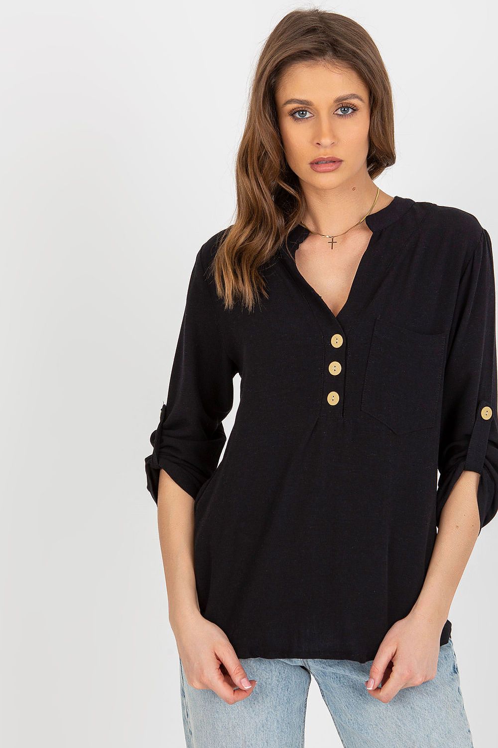 Chic Rue Paris cotton blend blouse in black, featuring a heart-shaped neckline, tucked into stylish jeans for an elegant and modern outfit.