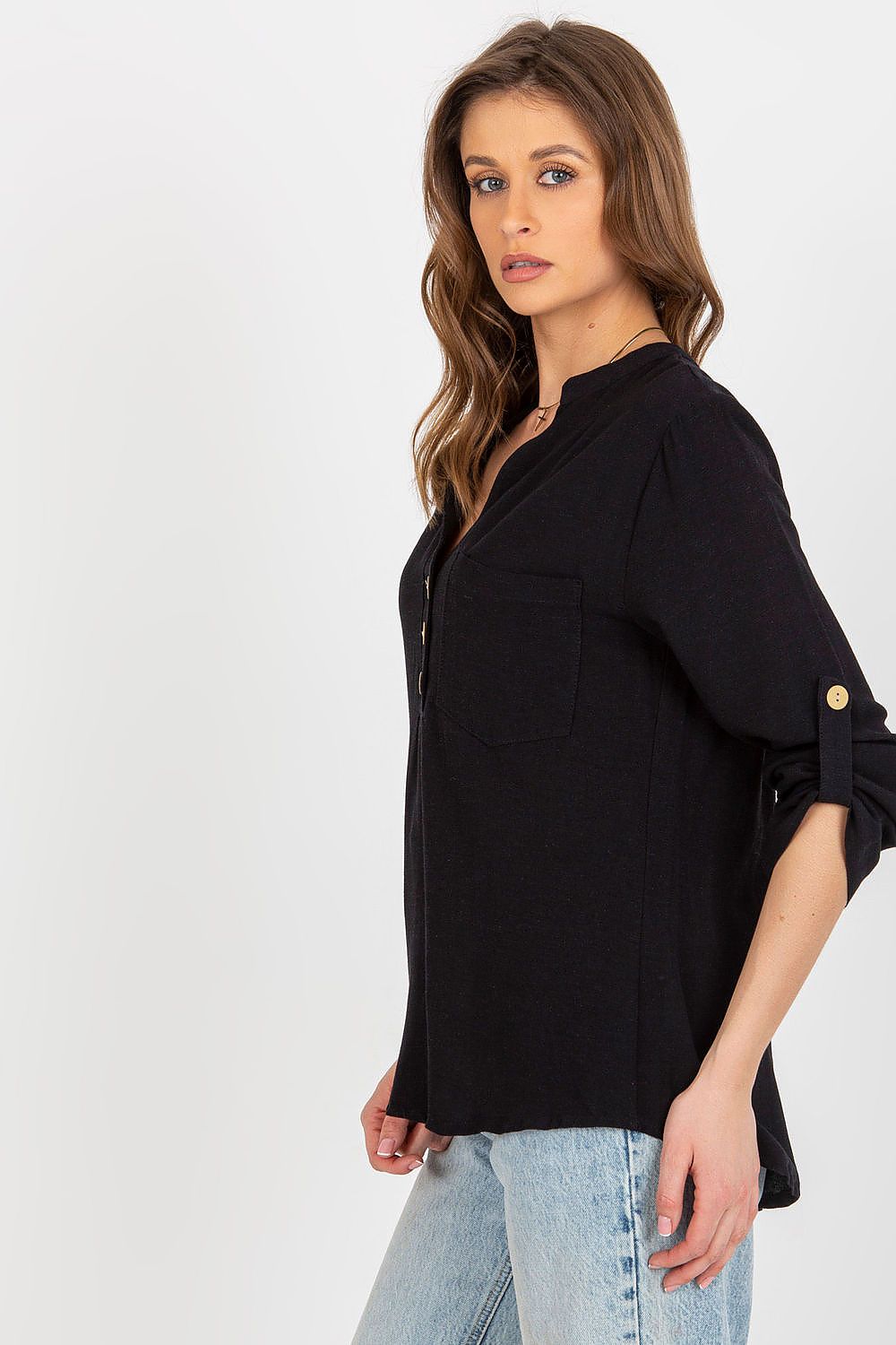 Elegant Rue Paris cotton blend blouse featuring a stylish heart-shaped neckline and long sleeves. The blouse is showcased in a chic black colour with a decorative clasp and a pocket, perfect for sophisticated occasions.