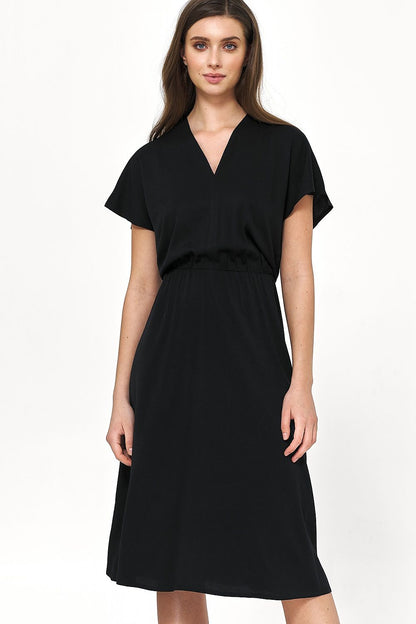 Chic black viscose daydress by Nife, featuring an envelope neckline and elegant waist gathering, ideal for both casual and formal occasions.