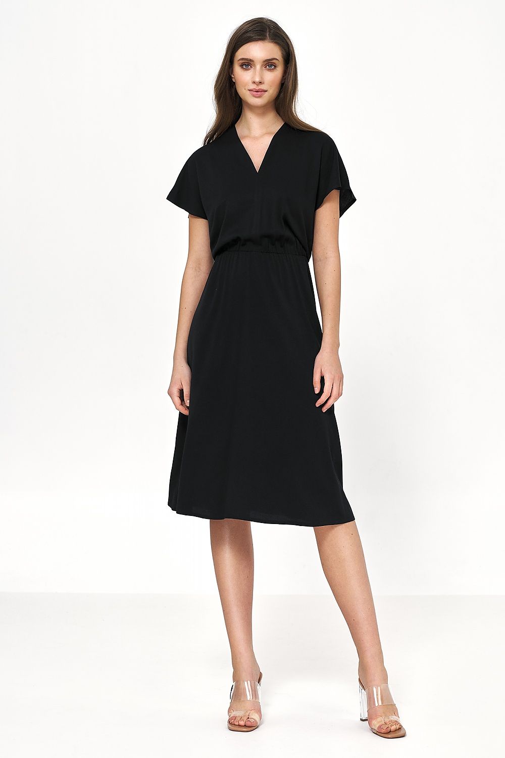 Elegant black viscose daydress from Nife featuring an envelope neckline, perfect for spring-summer occasions.