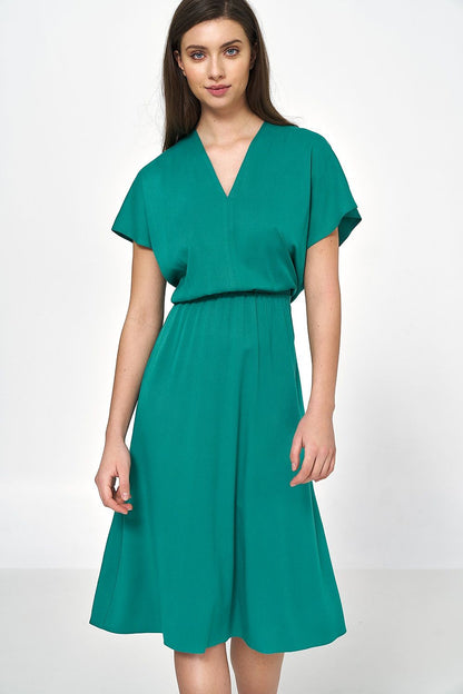 Chic teal viscose daydress by Nife showcasing a stylish envelope neckline, ideal for elegant outings in spring and summer.