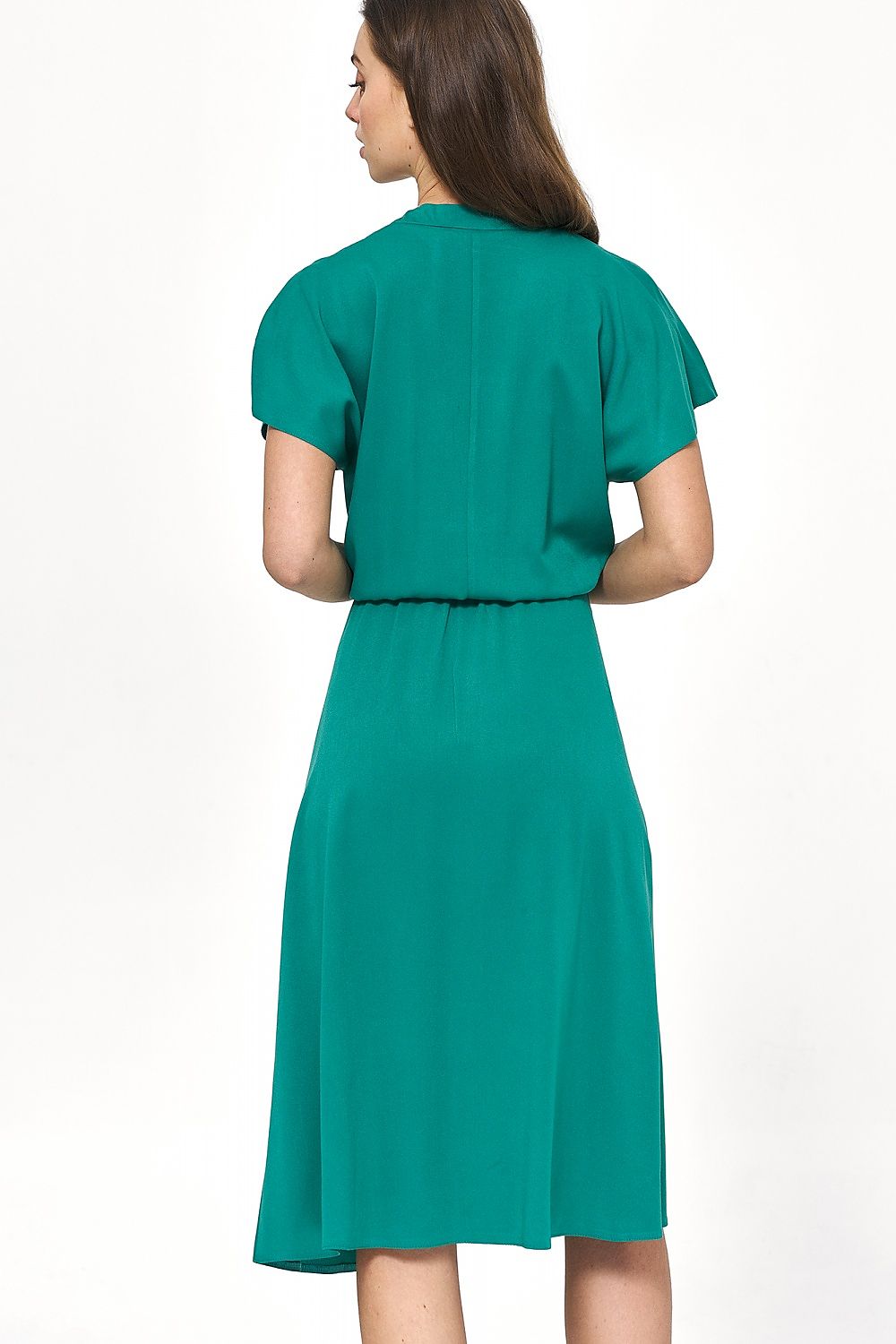 Back view of an exquisite teal viscose daydress by Nife, featuring flowing lines and designed for comfort in warm climates.