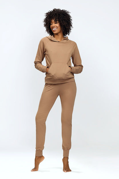 Dkaren luxury hoodie and classic sweatpants set, featuring a stylish woman wearing a tan outfit with front pocket, perfect for homewear and relaxation.