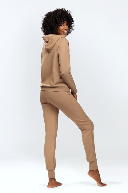 Dkaren luxury hoodie and classic sweatpants set, showing the back view of a woman in a tan outfit, emphasising comfort and elegance for casual wear.