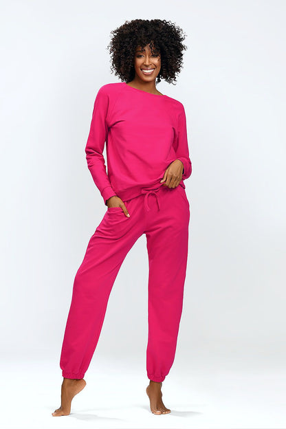 Stylish DKaren Venezia long sleeve sweatshirt and sweatpants set in vibrant pink, ideal for fashion-forward lounging.