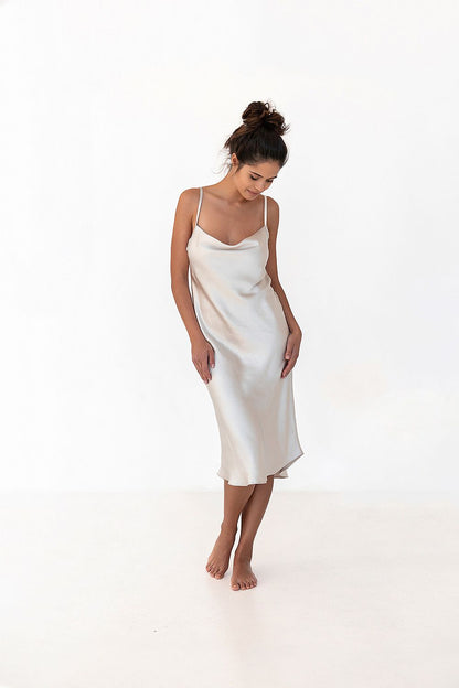 Elegant women's luxury satin nightshirt by Sensis, featuring thin straps and softly fitted silhouette, perfect for a comfortable yet sophisticated nightwear.