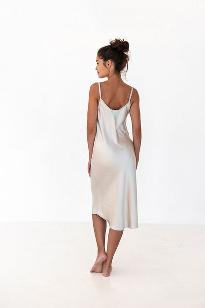 Rear view of the luxurious satin nightshirt for women by Sensis, showcasing thin straps and sleek design, ideal for a chic and comfortable lounging experience.