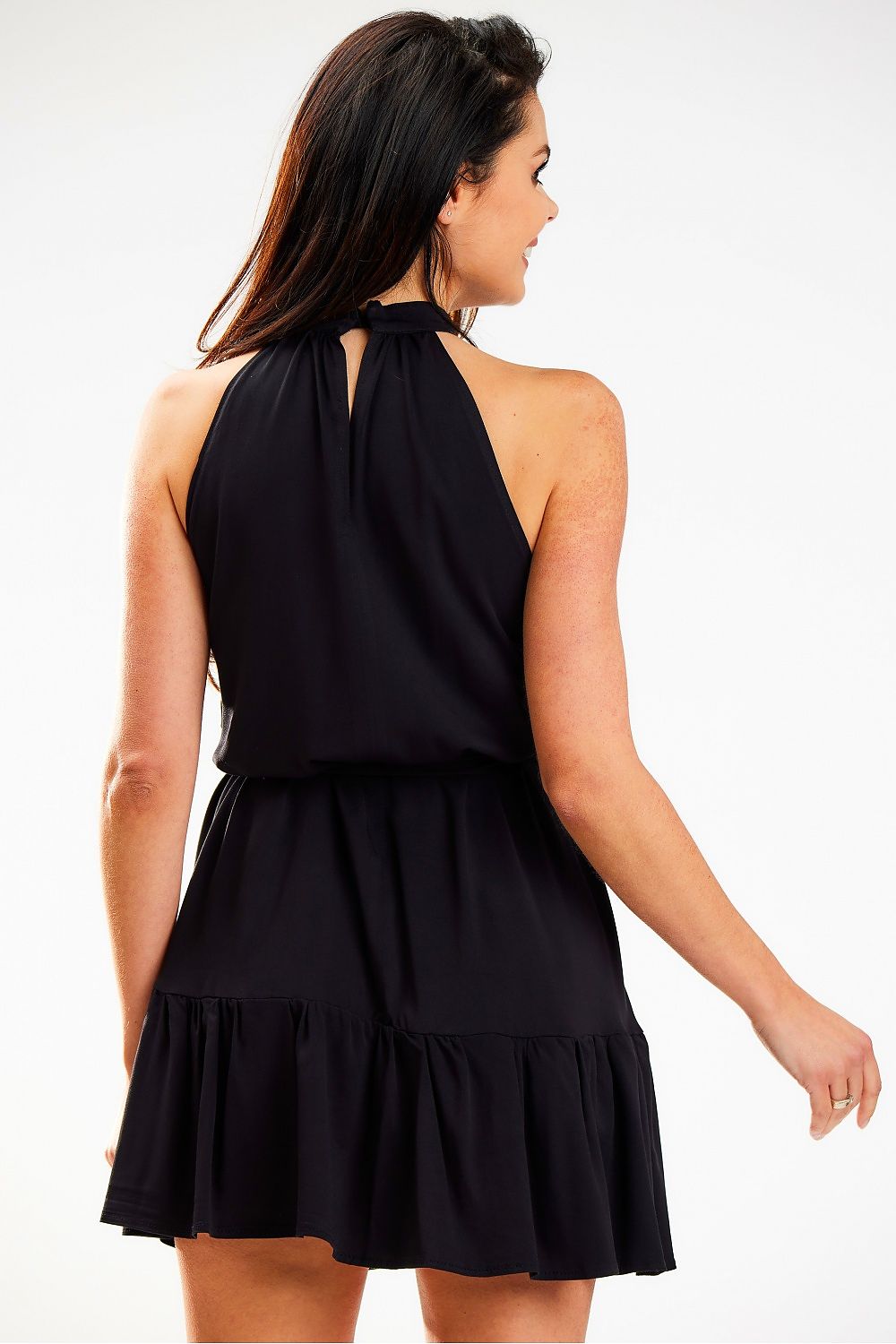 Stylish back view of a black loose flared daydress with a decorative neckline and waist tie, expertly designed by Awama. Perfectly encapsulating modern elegance and comfort.