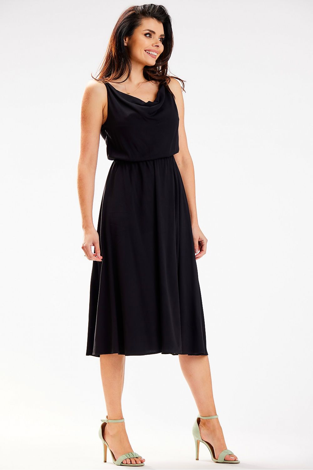 Front view of the black Awama midi dress, showcasing its elegant design with a cowl neckline and elastic waistband for a figure-enhancing fit.