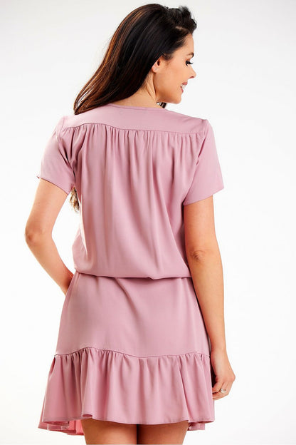Back view of a sophisticated chiffon daydress by Awama, demonstrating the soft drape and flattering silhouette, perfect for casual summer elegance.