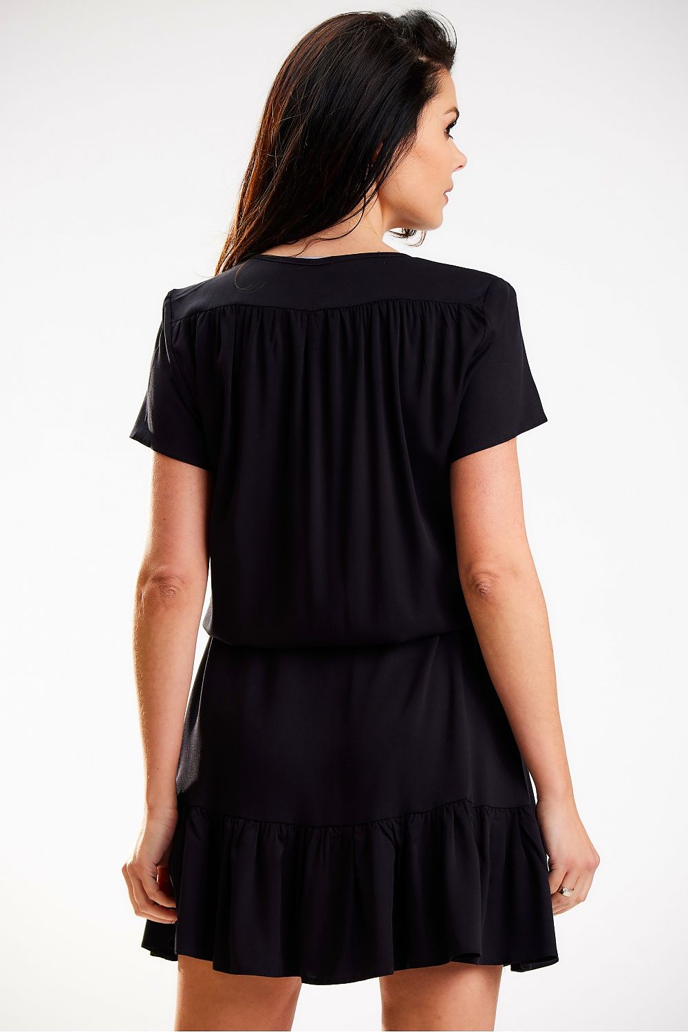 Elegant black chiffon dress with a ruffled hemline, designed by Awama, showcasing a flattering fit and lightweight fabric, perfect for summer outings.