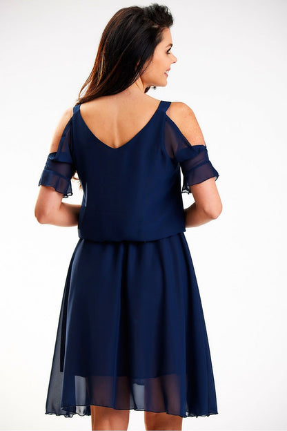 Back view of a luxurious navy chiffon summer dress with open shoulders and an elegant silhouette by Awama, ideal for warm evenings.