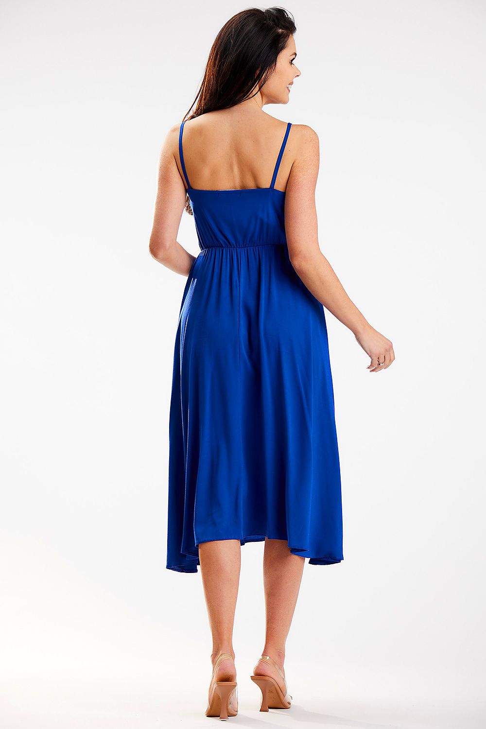Back view of the elegant blue Awama midi dress, emphasizing its flowing silhouette and fitted waist, ideal for effortless elegance.