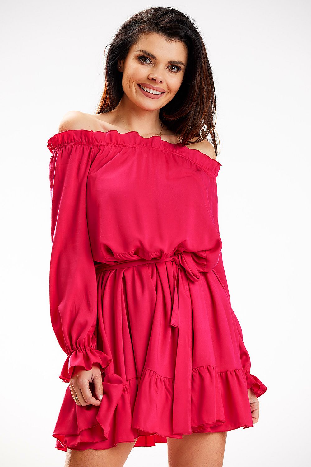A striking Awama Spanish A-Line dress in bold pink, with long sleeves and a frill hem, elegantly cinched at the waist, ideal for sophisticated events.