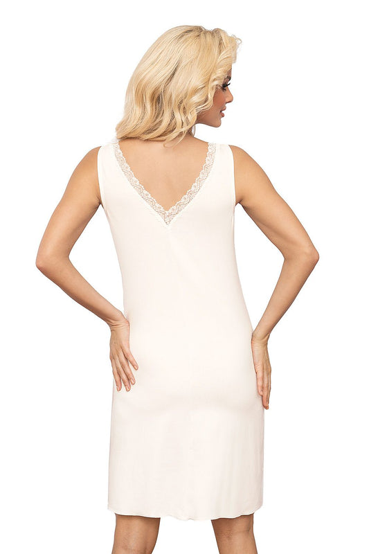 Back view of an elegantly designed women's lace detail t-shirt by T!SSI, featuring a delicate lace neckline and a classic cut, showcased in a mid-thigh length.