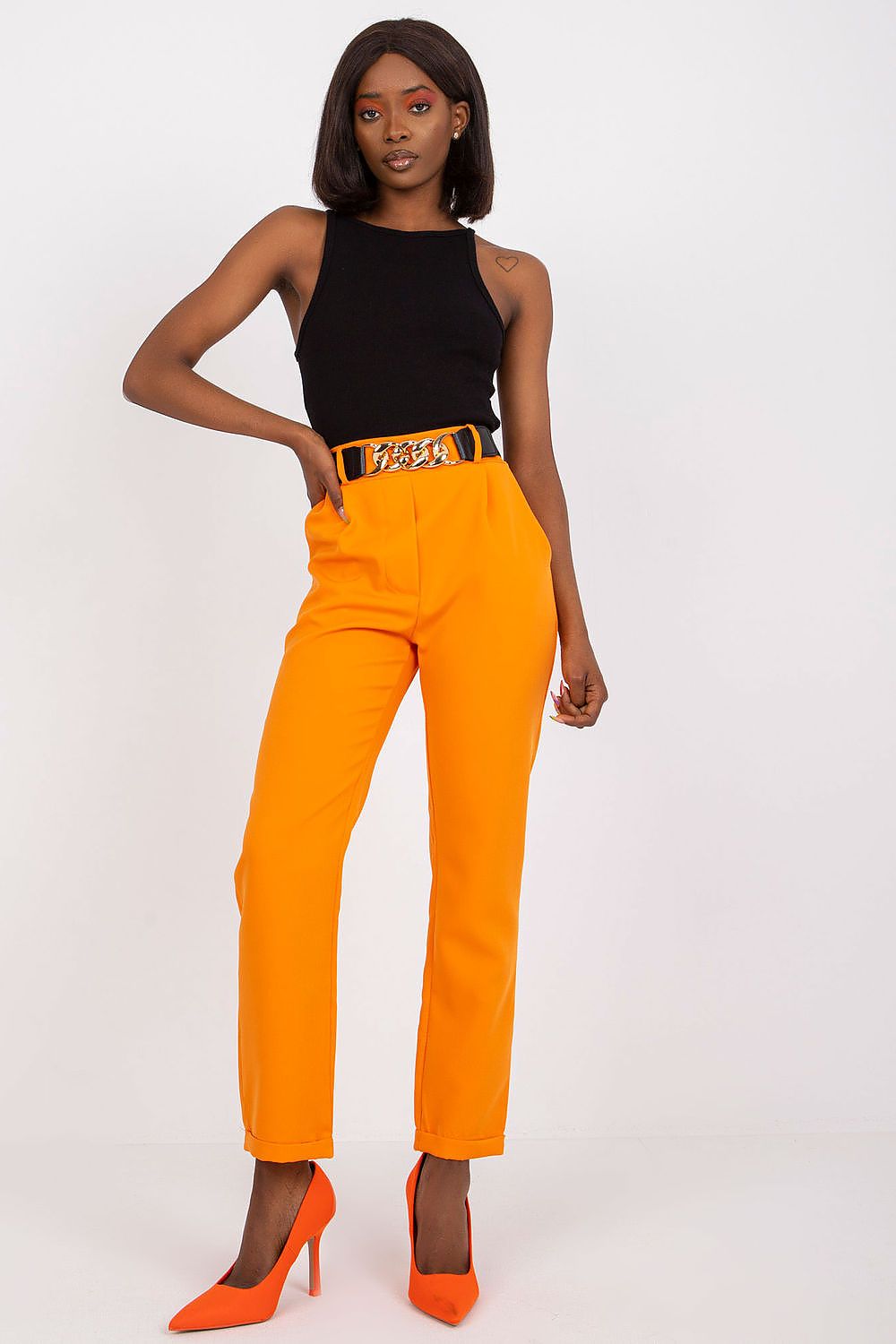 Trendy orange high rise trousers enhanced with a chic belt, epitomising elegance and versatility, crafted by Italy Moda.