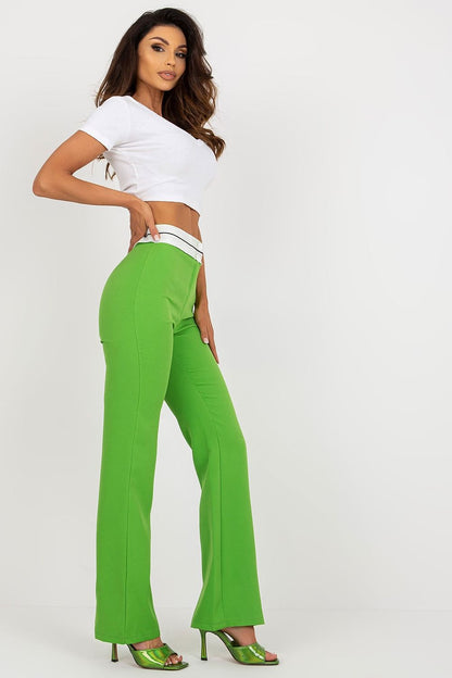 Elegant high-waisted straight cut trousers in vibrant green by Italy Moda, styled with a chic white cropped top.
