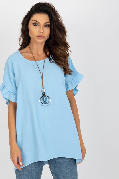 Italy Moda loose-fit blouse in soft blue, featuring elegant frill sleeves and a round neckline, styled with a chic statement necklace.