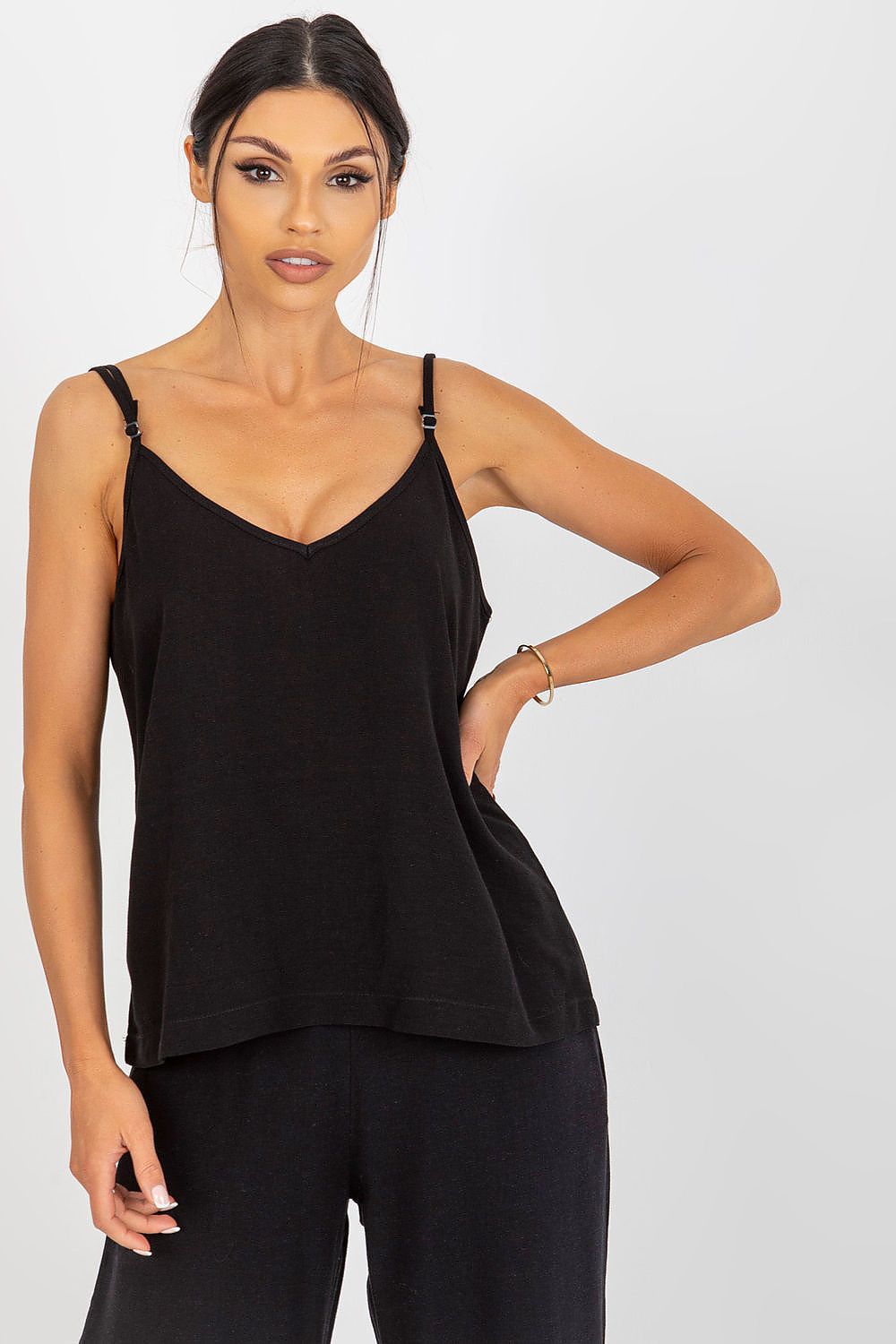 Sophisticated black loose-fitting V-neck shirt with adjustable straps by Och Bella, complementing a sleek loungewear style.