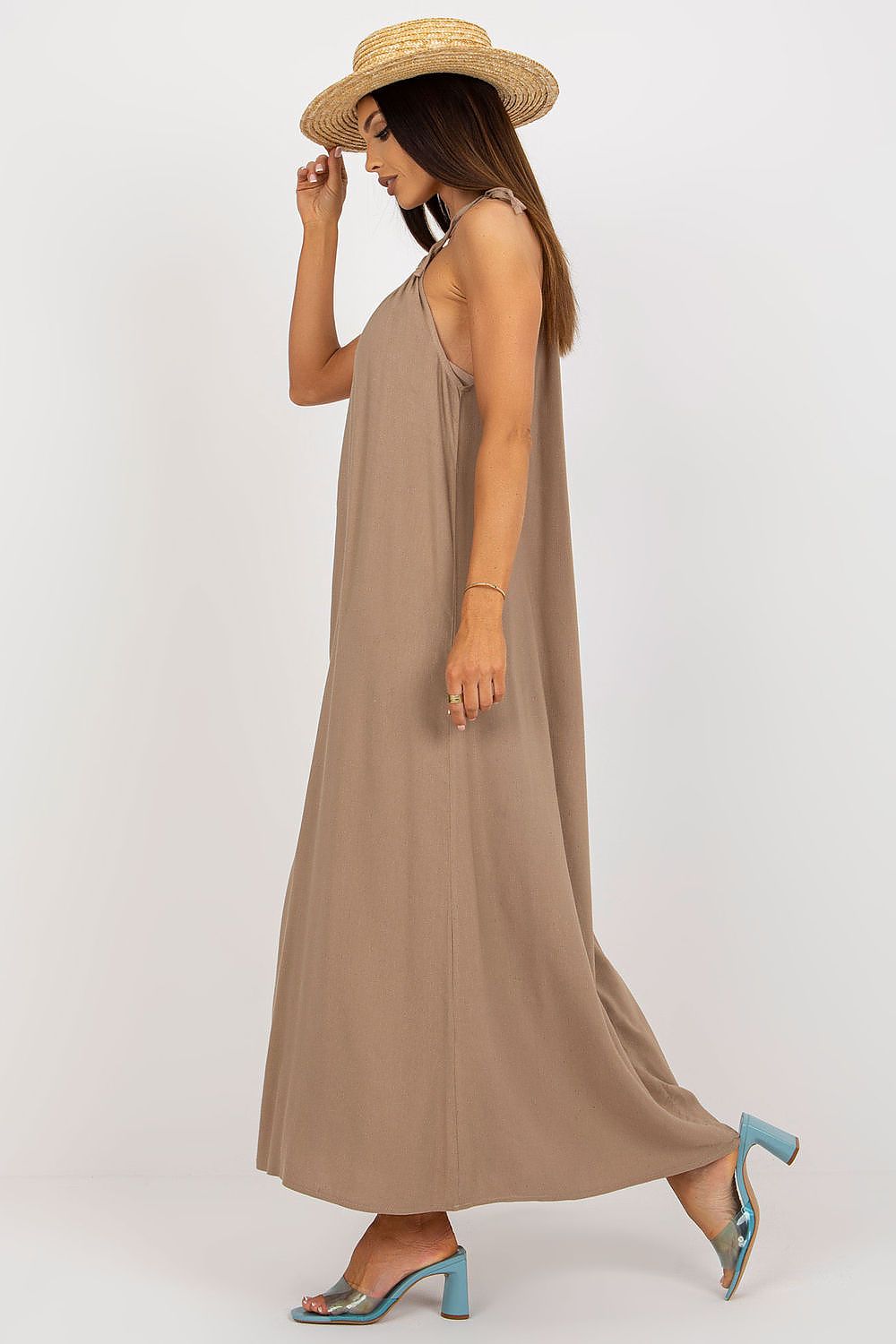 Elegant Och Bella summer long dress featuring a loose cut and tied straps, showcased on a model wearing a stylish straw hat and fashionable heels.