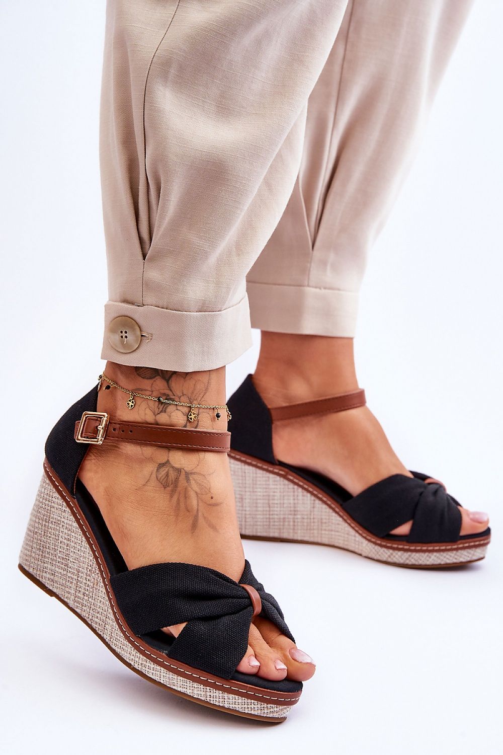 Elegant women's sandals by Step in Style featuring an adjustable strap, 8cm heels, and a stylish non-slip sole, ideal for summer fashion. The sandals are worn with beige trousers, showcasing their chic design.