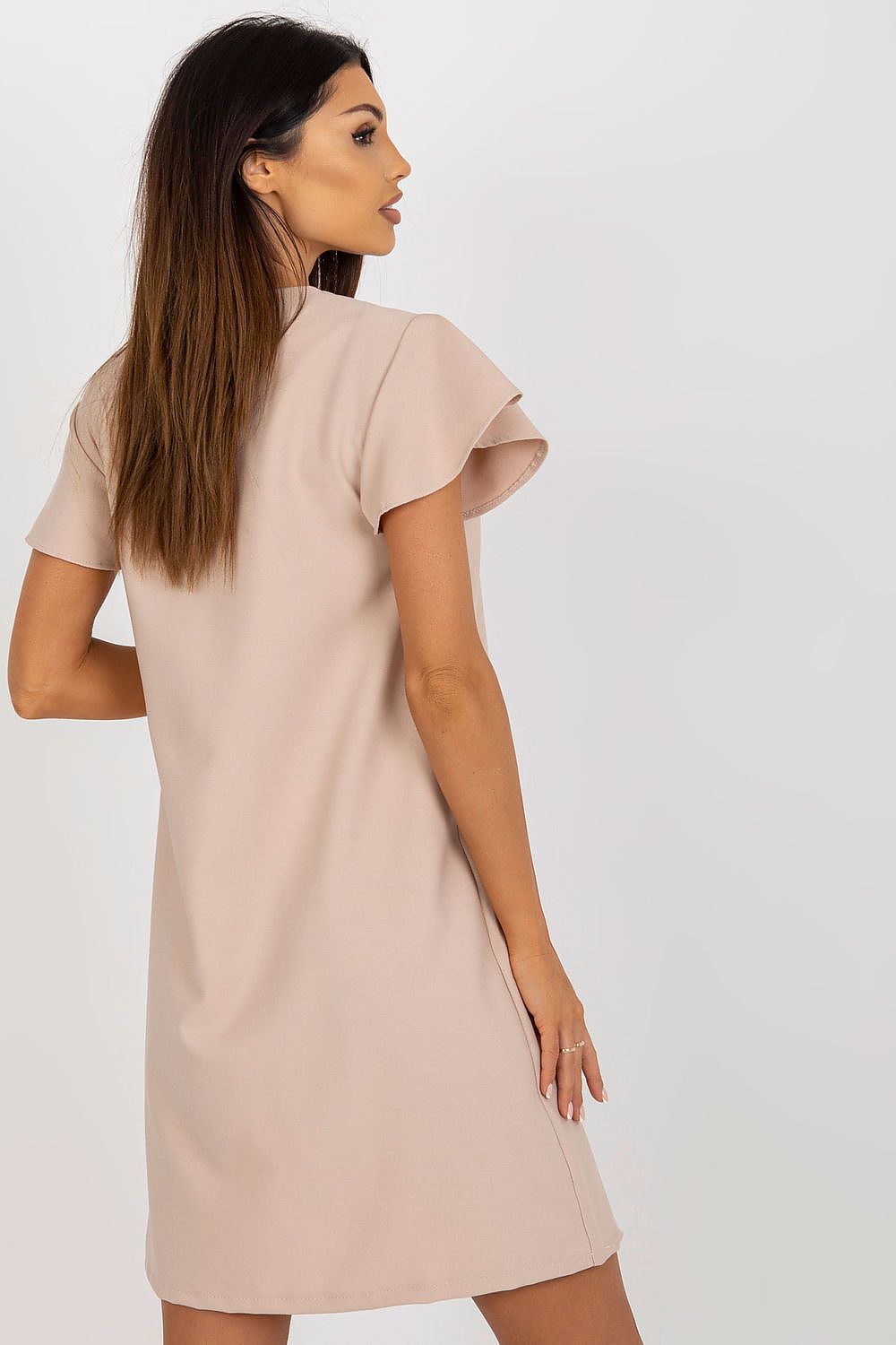 Back view of an elegant loose-fitting daydress by Rue Paris, designed with ruffle sleeves and luxurious lace accents, ideal for a chic daytime look.