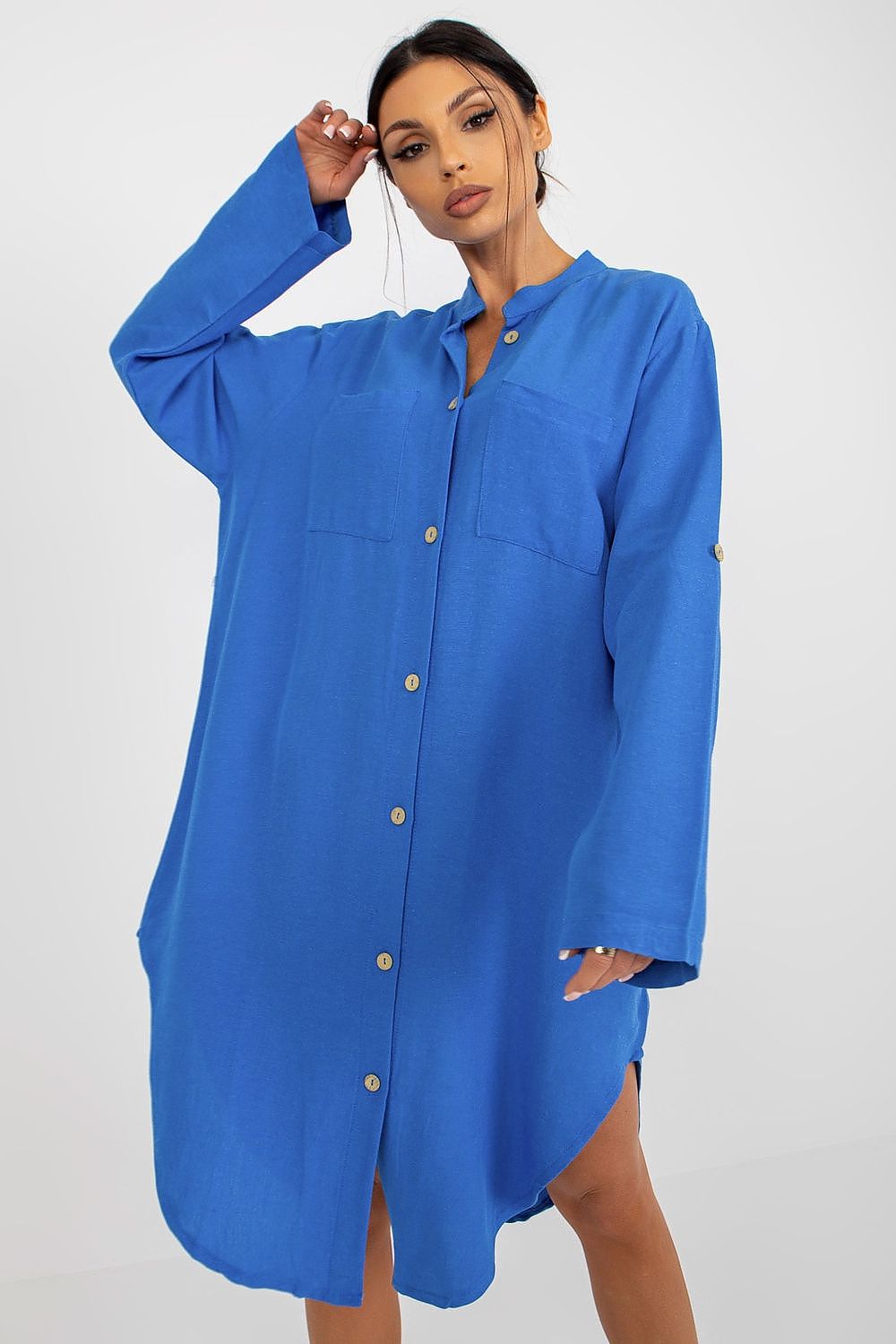 Vibrant blue shirt-cut dress by Och Bella with a relaxed fit, long sleeves, and stylish button-down details, perfect for a luxurious casual look.