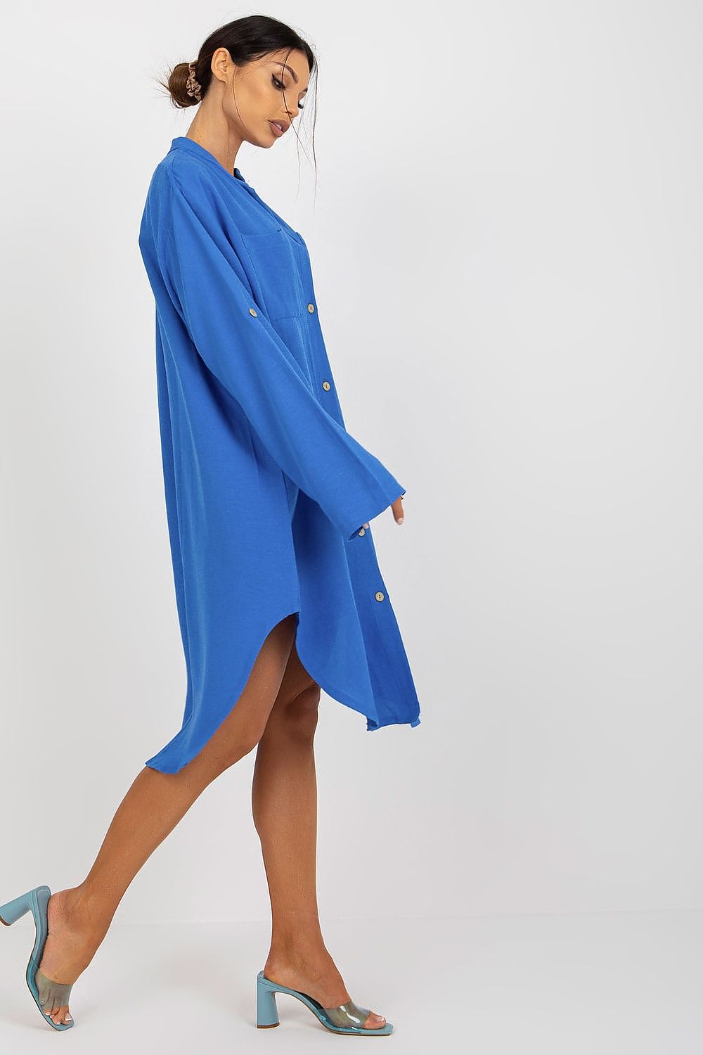 Sophisticated blue shirt-cut dress by Och Bella, designed with a feminine fit, button-down closure, and easy movement, paired with stylish footwear.