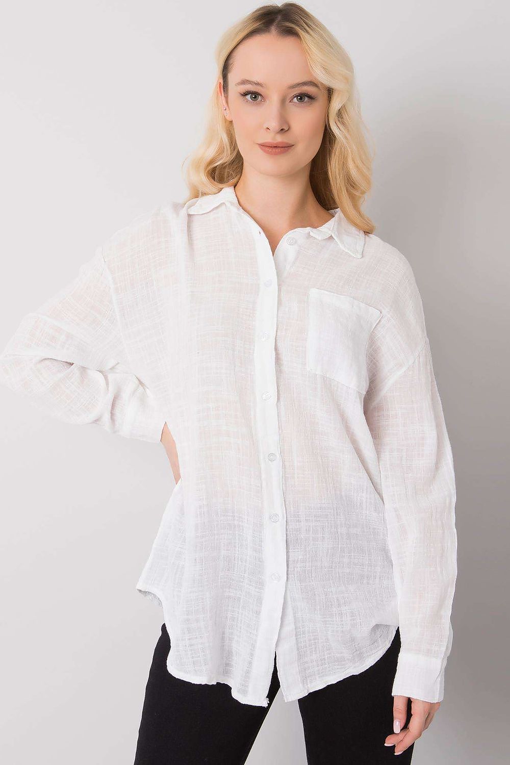 Chic Och Bella Cotton Long Sleeve Shirt in classic white, featuring a button front and pocket, elegantly worn by a model posing confidently.