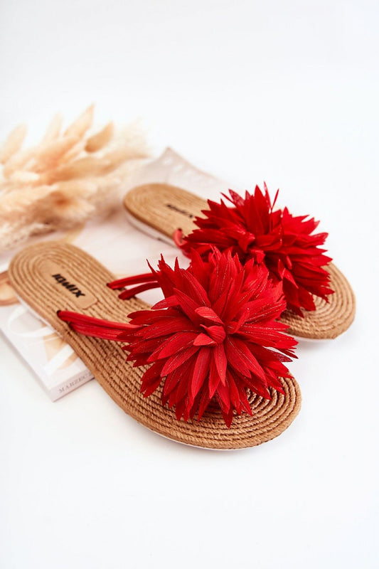 Chic luxury Japanese flip-flops by Step in Style, adorned with bold red flower accents on a natural woven sole, ideal for stylish summer outings.