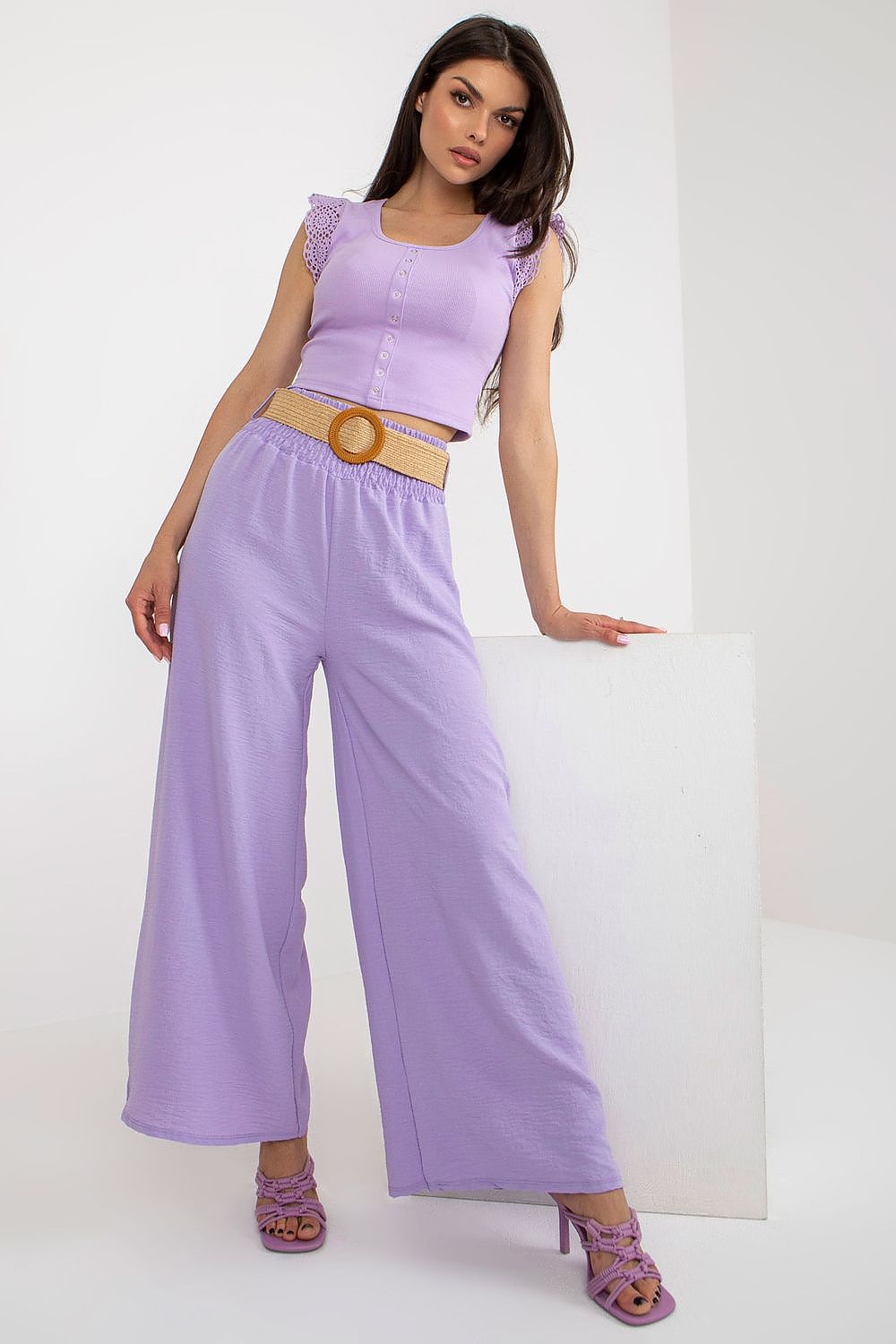 Italy Moda Women's High Rise Wide Leg Trousers elegantly styled with decorative creases and belt, perfect for chic outings.