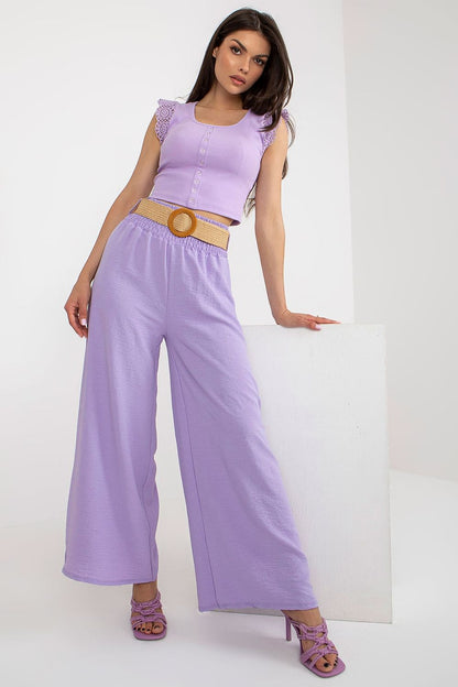Italy Moda Women's High Rise Wide Leg Trousers elegantly styled with decorative creases and belt, perfect for chic outings.