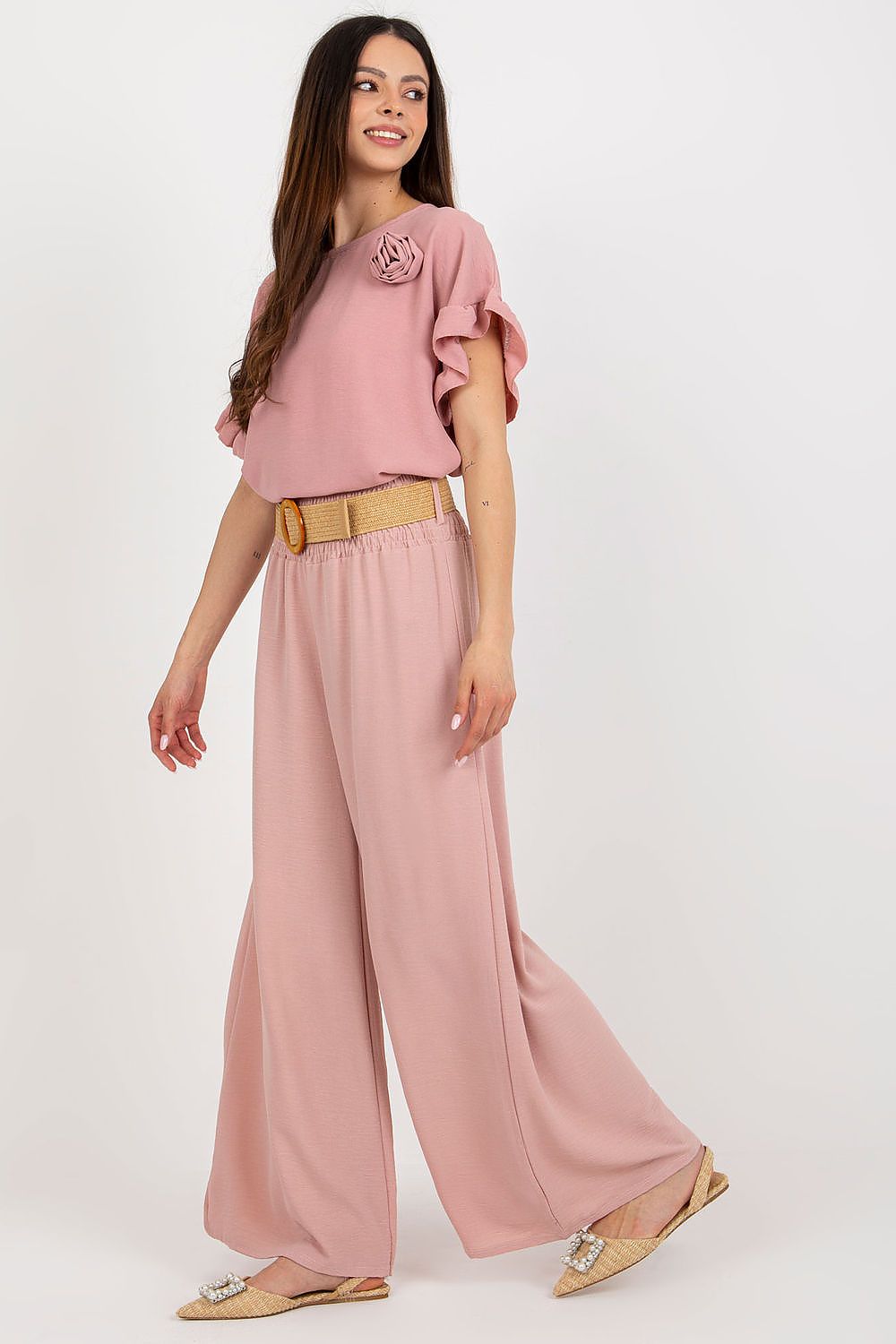 Italy Moda Women's High Rise Wide Leg Trousers, featuring a sophisticated wide leg design and decorative creases in a chic setting.