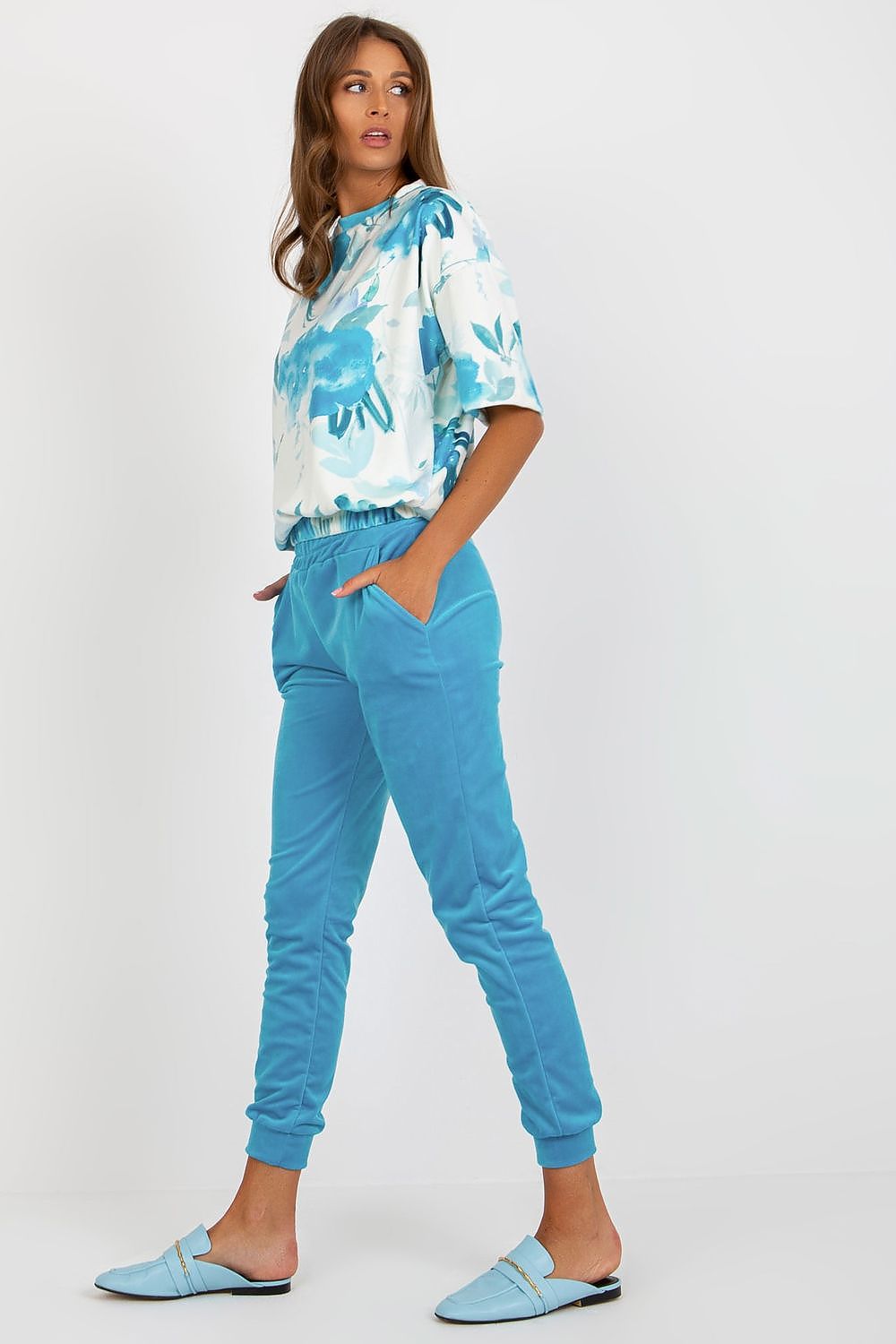 Close-up view of the velour fabric texture on the blouse and pants set by Rue Paris, highlighting its premium quality.