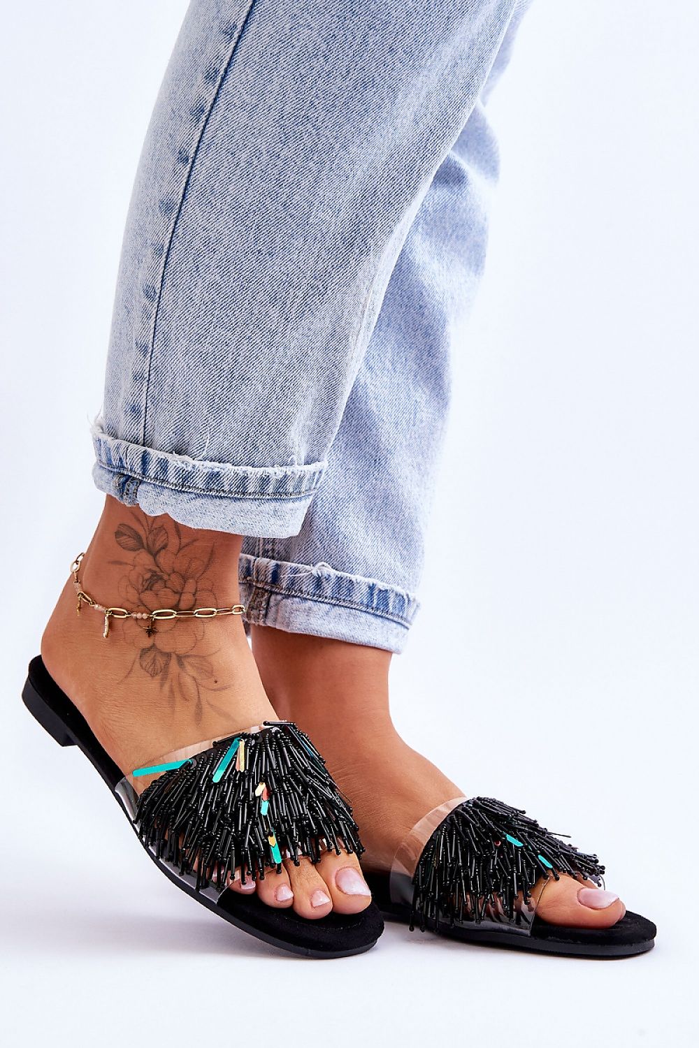 Elegant women's eco-suede flip-flops with bead embellishments from Step in Style, featuring a comfortable insole and a stylish, trendy design.