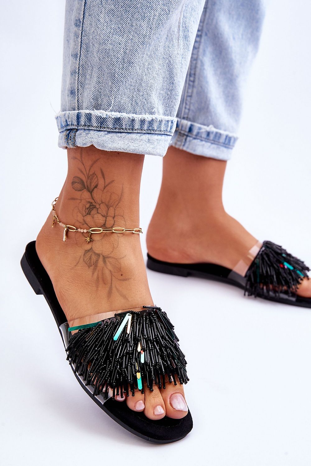 Fashion-forward women's flip-flops with a non-slip sole and eco-friendly comfort insole, showcasing luxury and style from Step in Style.