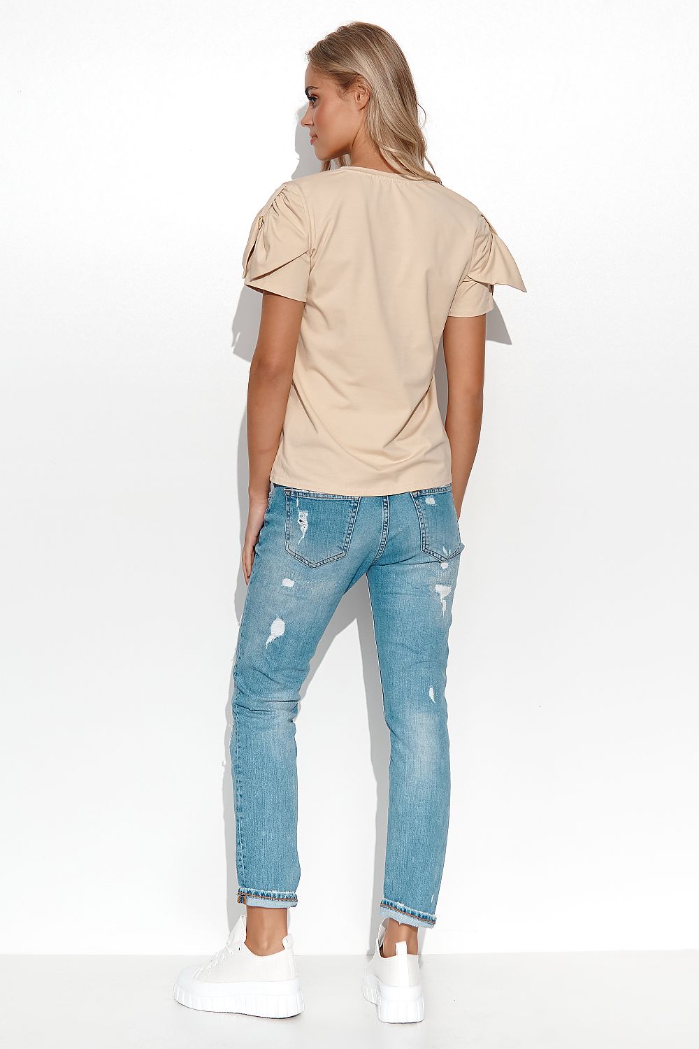 Elegant Makadamia women's blouse featuring a heart neckline, stylish sleeves, and a decorative gold plate, perfect for sophisticated styling.