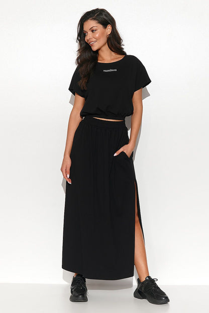 Numinou women's cotton blend ribbed blouse showcasing modern elegance, perfect for casual occasions.