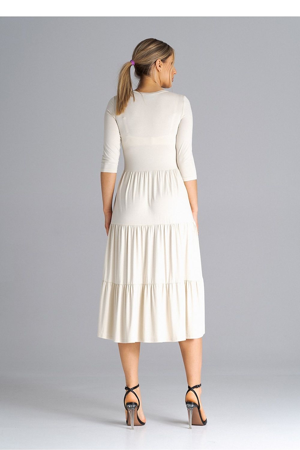Back view of Figl Midi Dress, capturing the sophisticated design and flattering fit for a timeless look.
