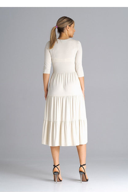 Back view of Figl Midi Dress, capturing the sophisticated design and flattering fit for a timeless look.
