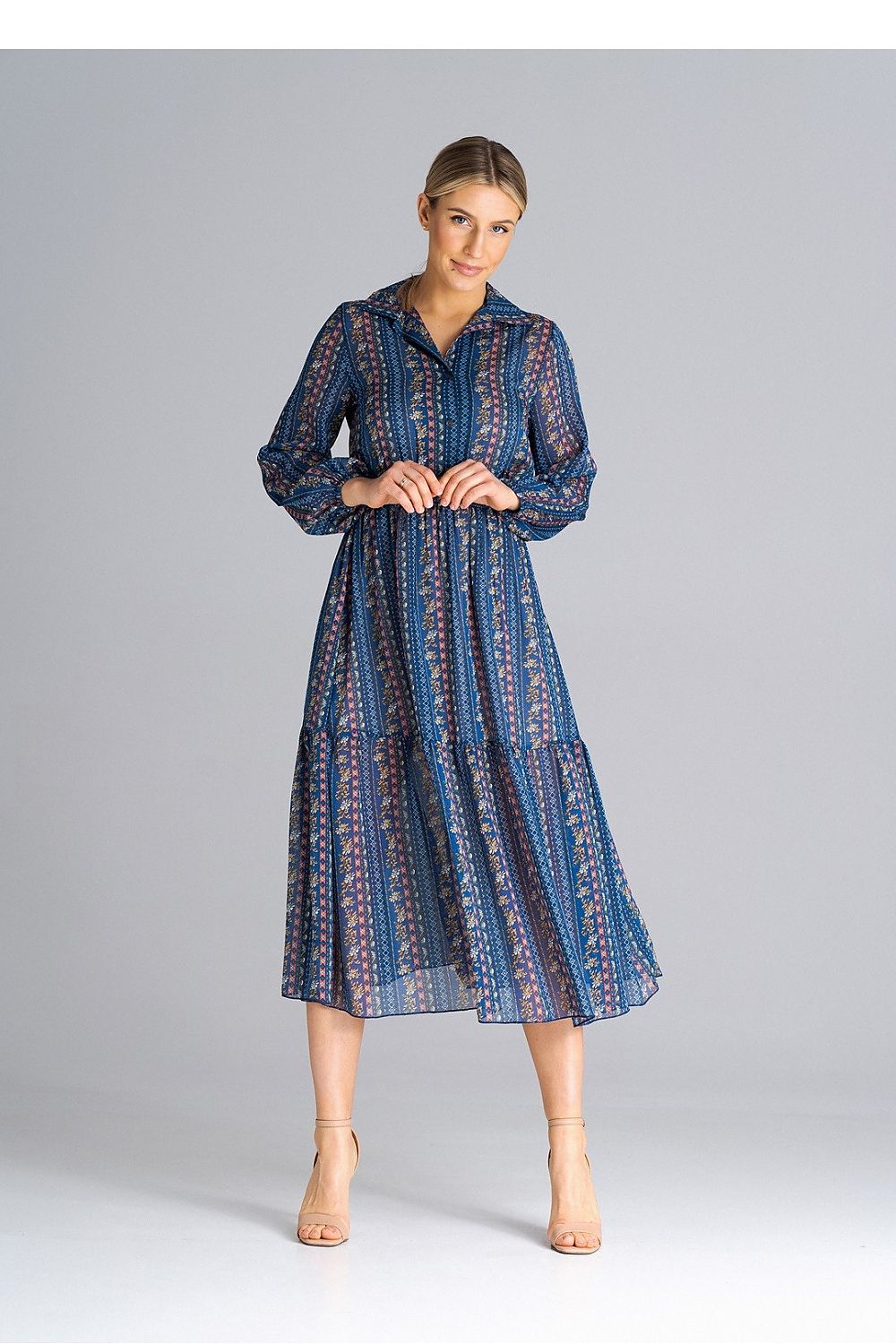 Beautifully designed Figl Midi Length Daydress with long sleeves, highlighting its stylish ruffled hem and comfortable fit.