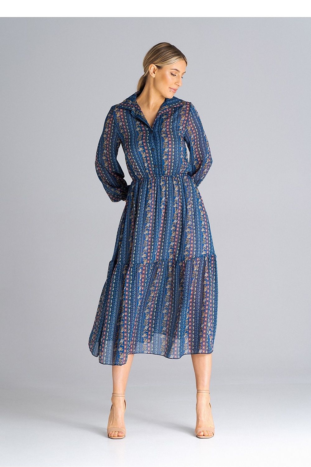 Chic details of the Figl Midi Length Flared Daydress, showcasing its buttoned waist, crinkled elastic long sleeves, and stunning ruffle at the hem, crafted for a refined look.