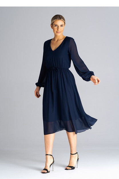 Elegant flared daydress by Figl, featuring long sleeves, a pleated waist, and a chic neckline, perfect for sophisticated everyday wear.