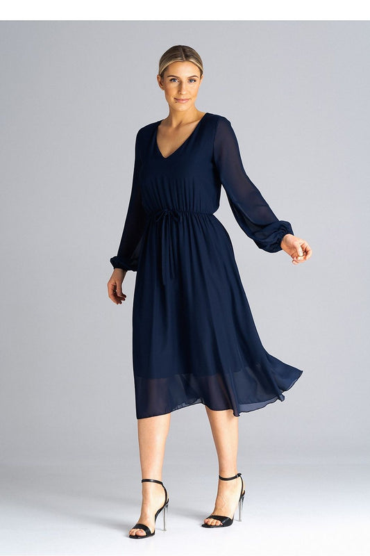 Elegant flared daydress by Figl, featuring long sleeves, a pleated waist, and a chic neckline, perfect for sophisticated everyday wear.