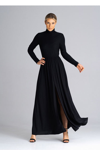 Model wearing Figl maxi dress with turtleneck and flared hem, exemplifying luxury and style for formal events.