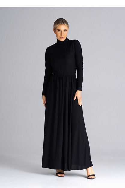 Luxurious Figl maxi dress styled with a fitted bodice and elegant flared skirt, showcasing a crinkle at the waist for a flattering silhouette.