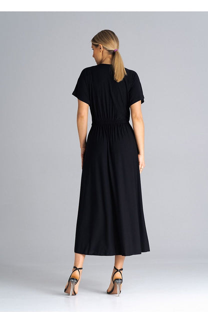 Chic Figl dress showcasing side cracks at the bottom, combining modern fashion with timeless elegance.