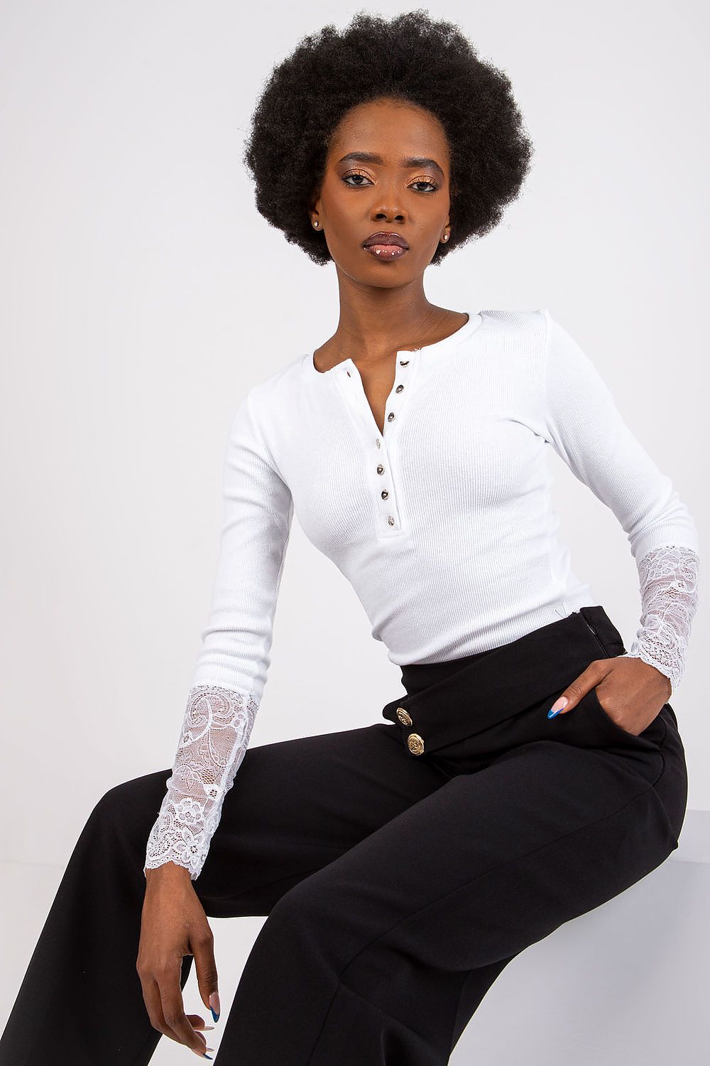 Elegant ribbed blouse with lace detail by Rue Paris, showcasing a luxurious design perfect for both casual and chic occasions.